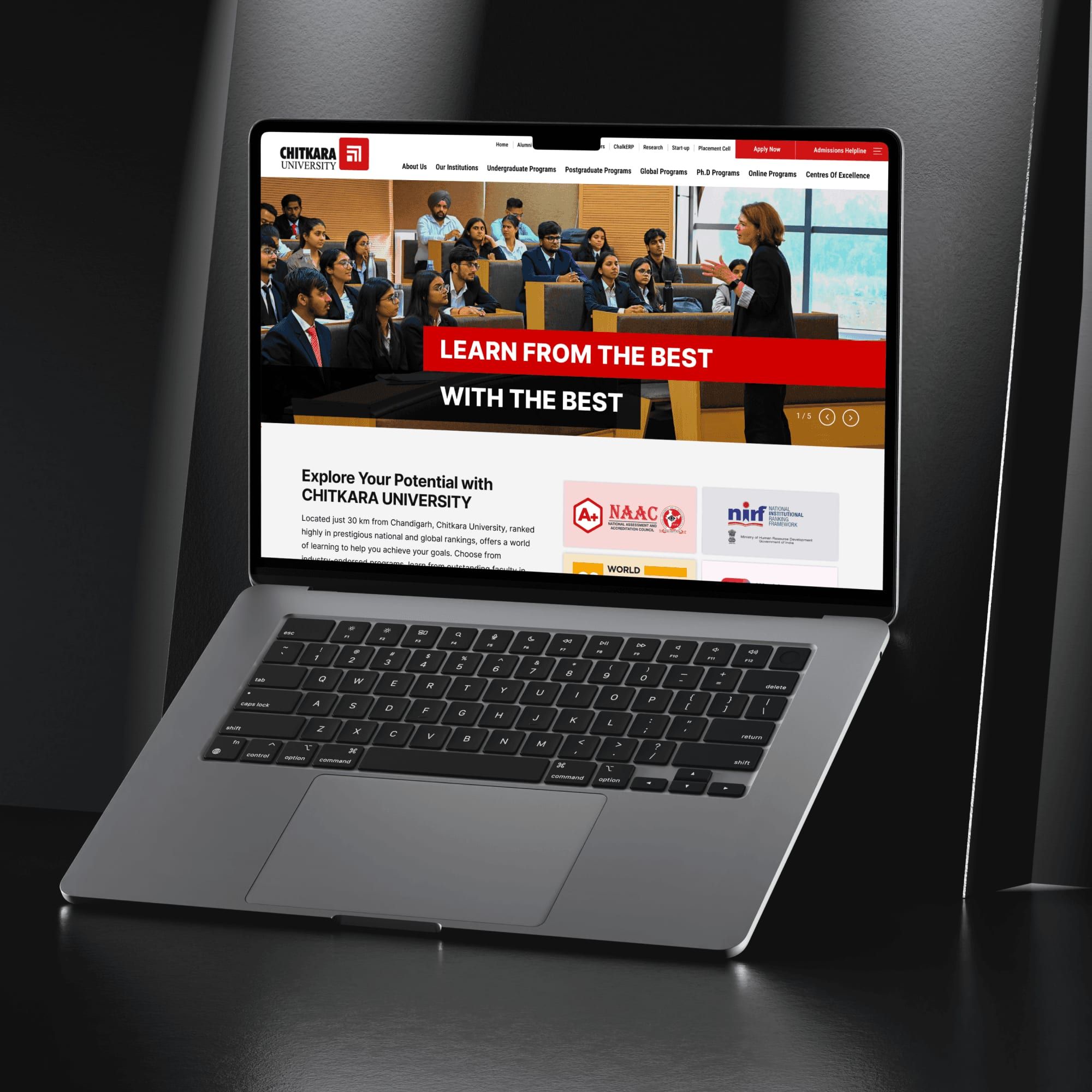 Chitkara University home page on a laptop