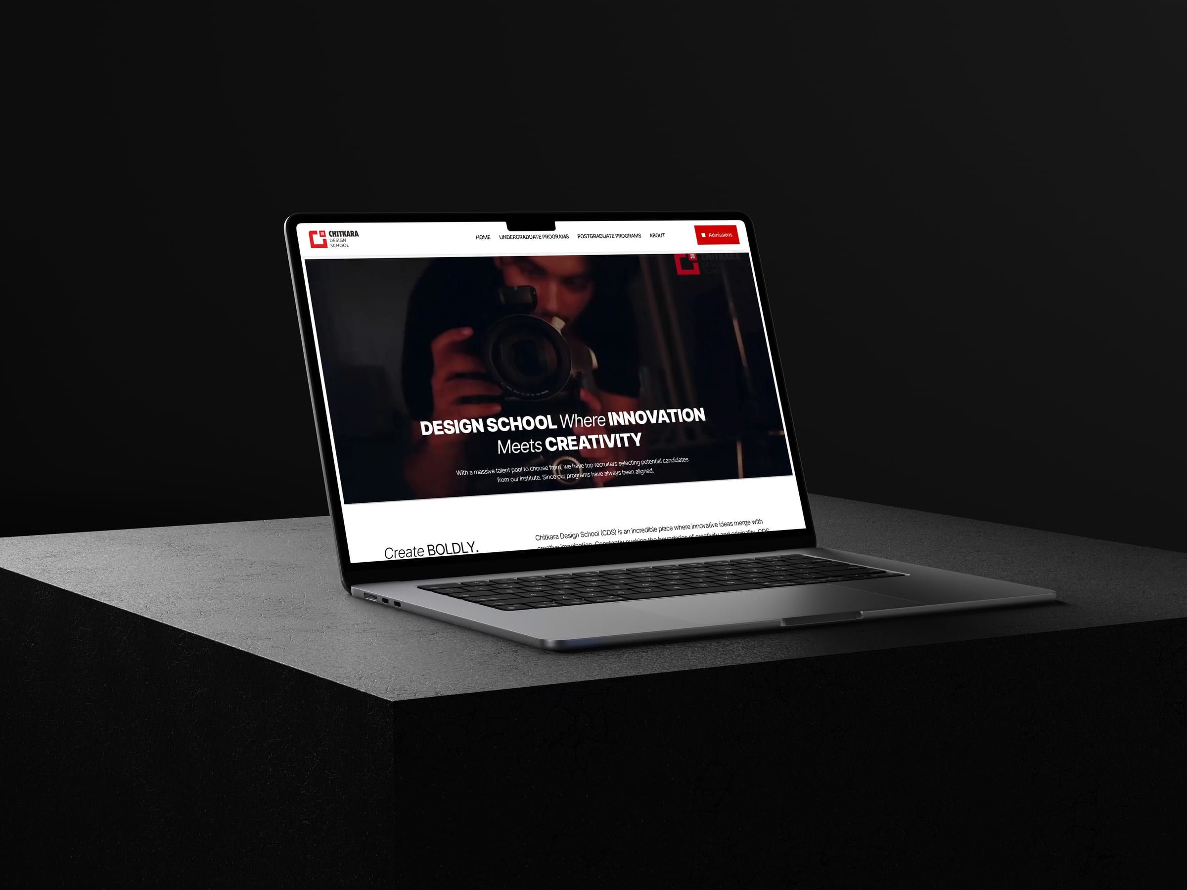 Chitkara Design School home page on a laptop