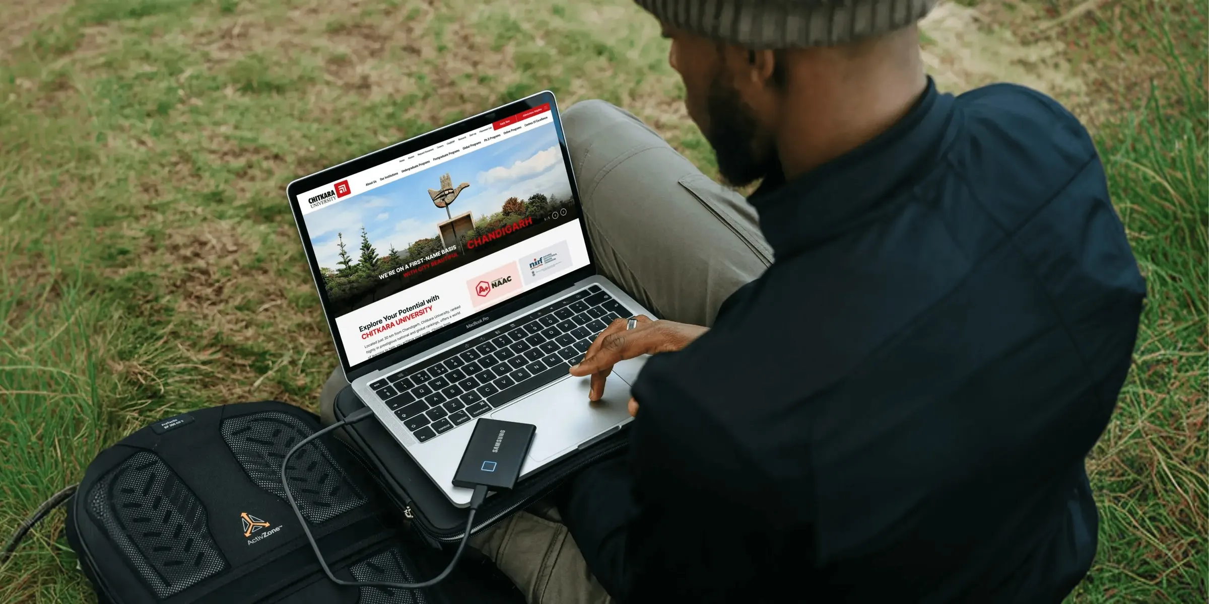 Chitkara University website on a laptop